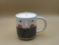 Ceramic mug Candle with a face design, filled with a candle, on a beige background